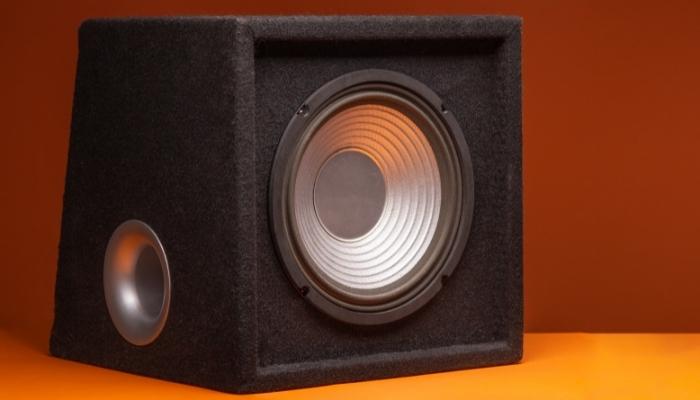 CI_what-are-subwoofers-and-why-you-need-them_1.jpg Subwoofer with orange background