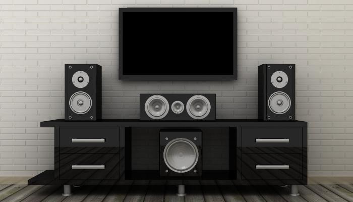 CI_what-are-subwoofers-and-why-you-need-them_4.jpg Sound system with woofer in the front and bottom center