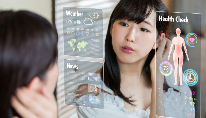 CI_Smart-Home-Sensors_4.jpg Woman seeing weather notifications on smart mirror