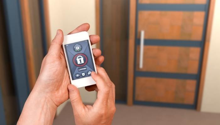 CI_Get-A-Home-Security-System_2.jpg Locking smart lock with phone