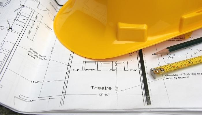 CI_Hire-Integrator-for-Home-Theater_1.jpg Hard hat place on top of home theater plans