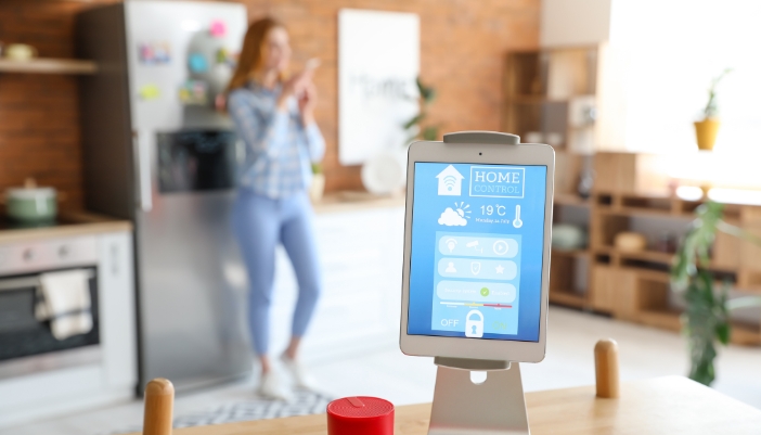 CI_Custom-AI-Automation_1.jpg Woman using voice commands in smart home