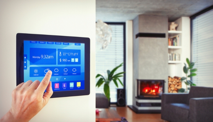 Closeup of someone using a centralized hub to control their smart home