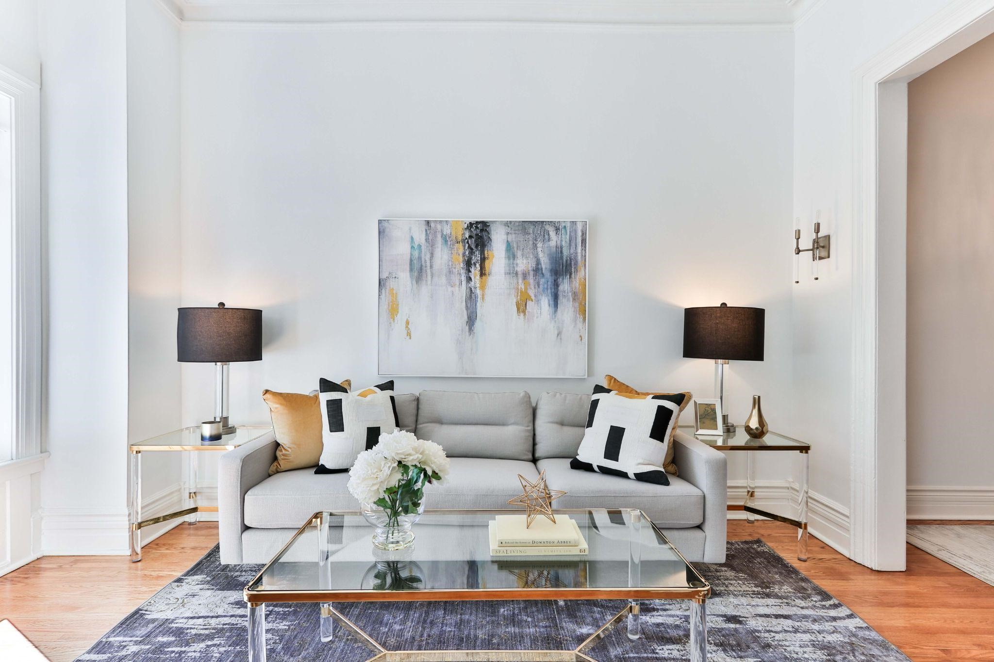 Wide shot of living room with mid century sofa and decor