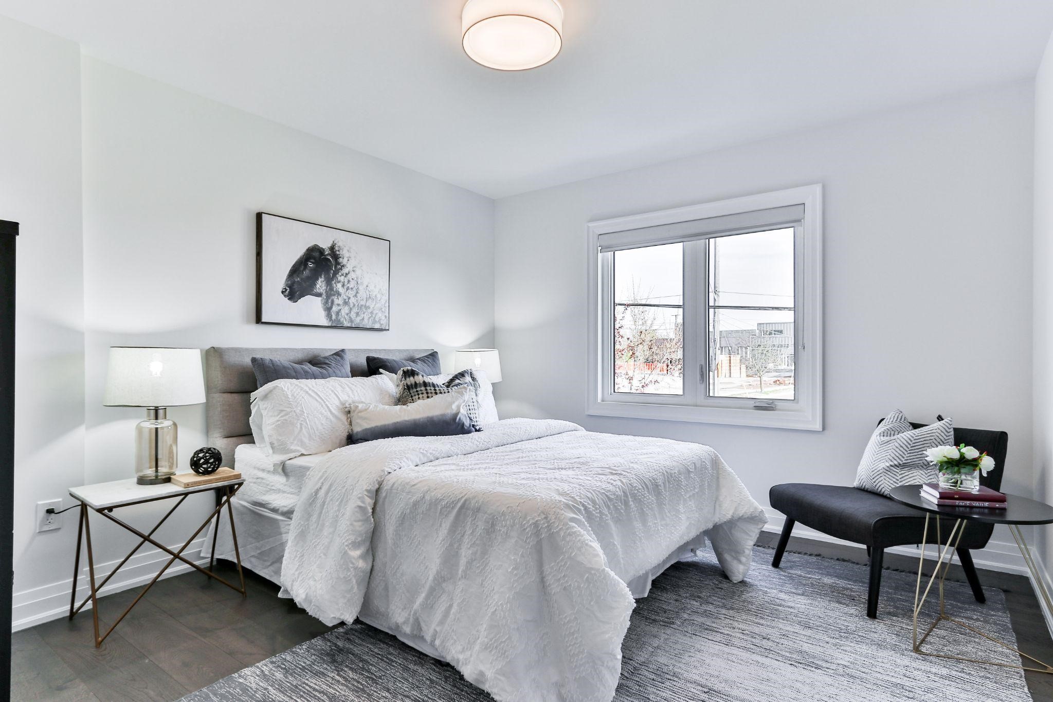 Black and white bedroom with clean lined-furniture