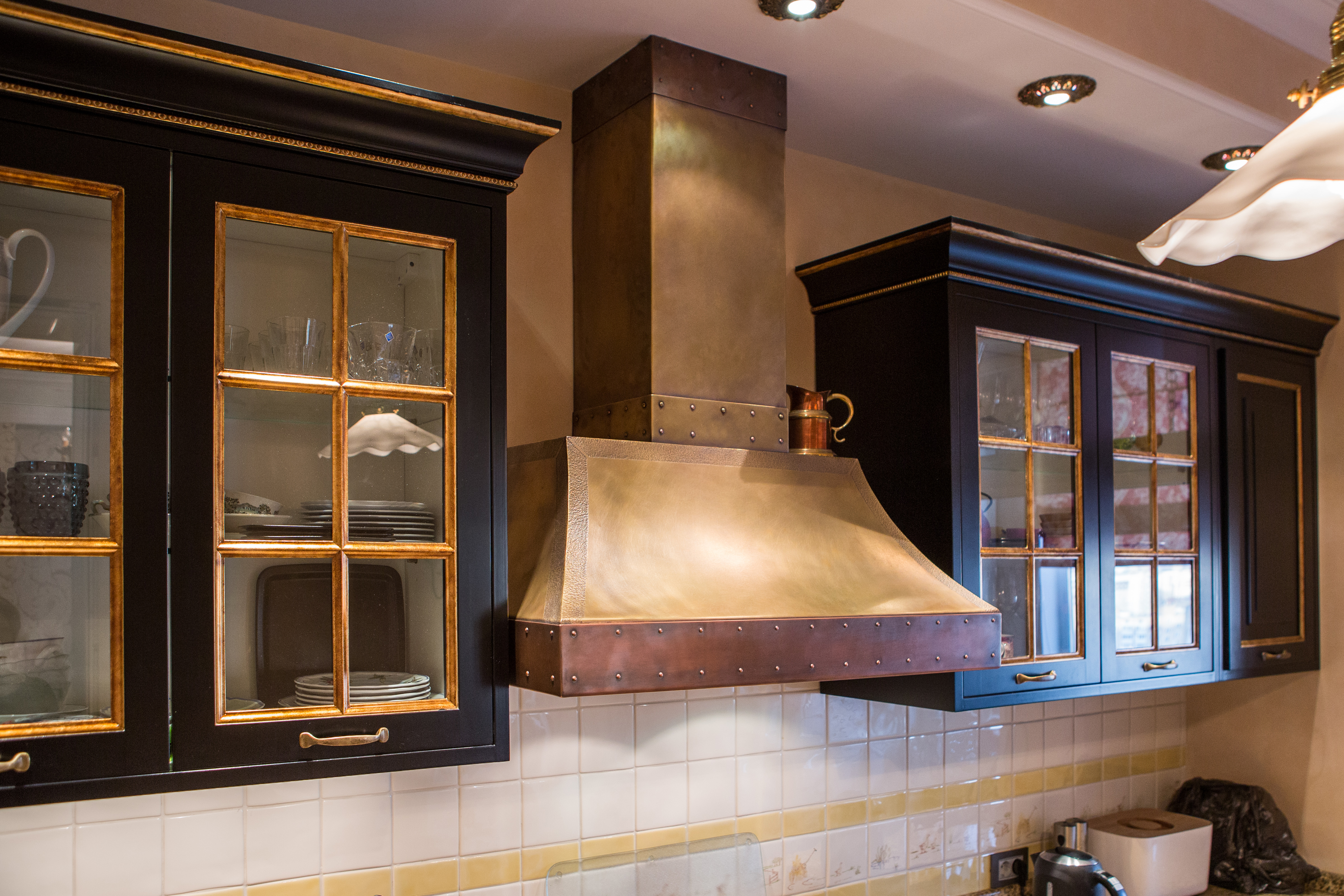 What goes better with professional quality ranges than a big bold statement range hood?