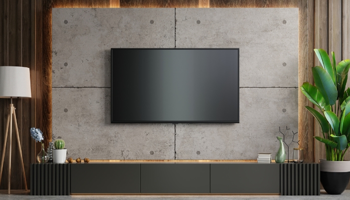 Elec_TV-Mounting-101_2.jpg A living space with a TV mounted on a wall, screen off