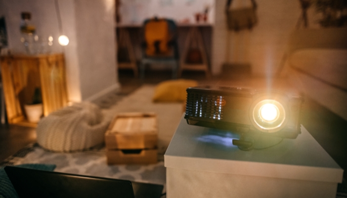 A projector on in a compact living room