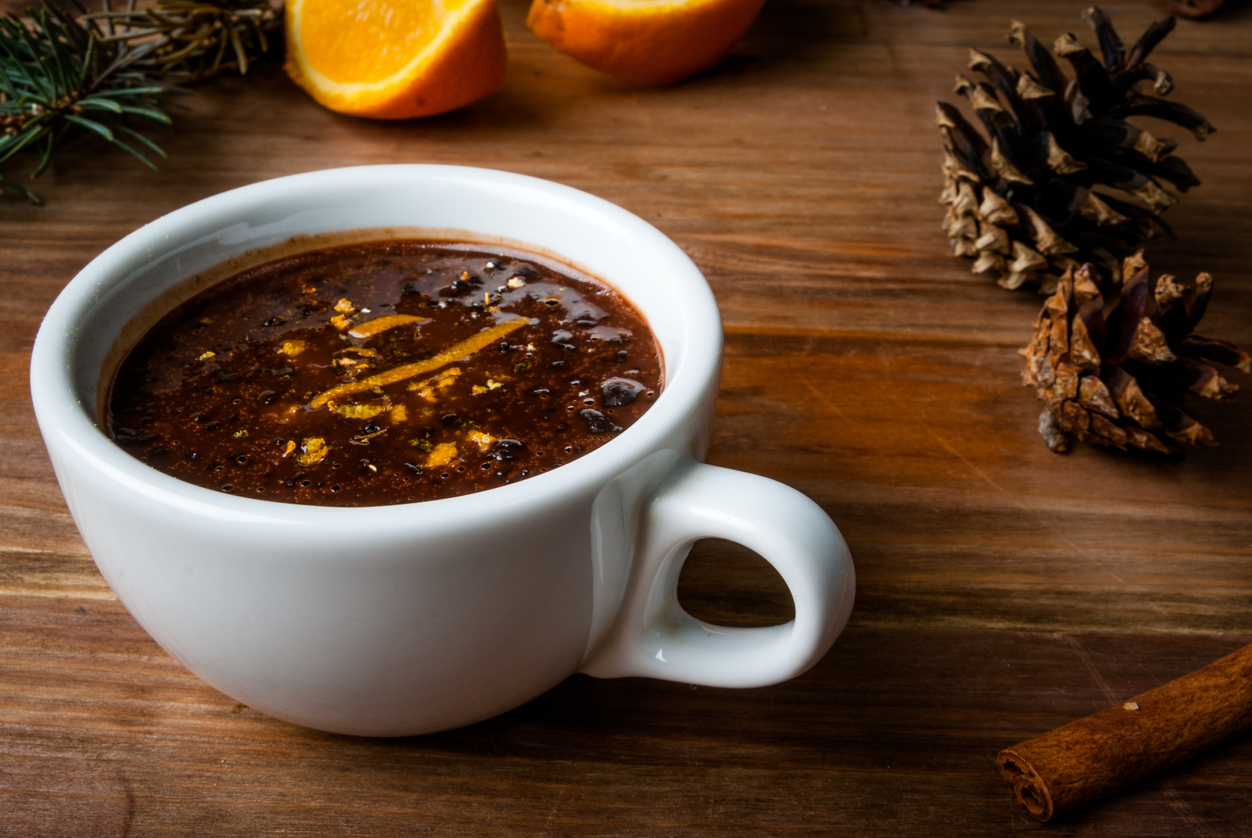 iStock Credit: Rimma_Bondarenko hot chocolate with spices, orange, and orange zest