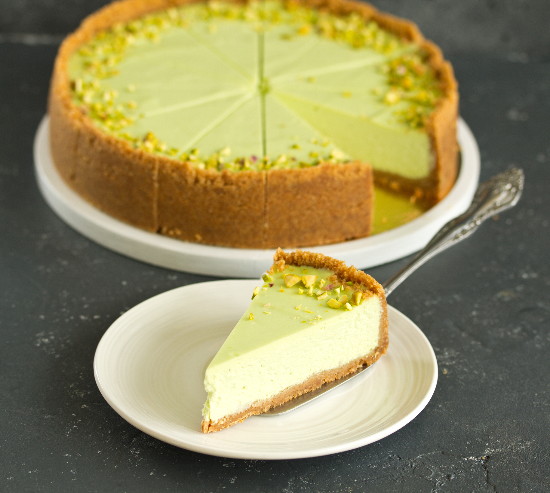 Lessy big slice of pistachio cheesecake