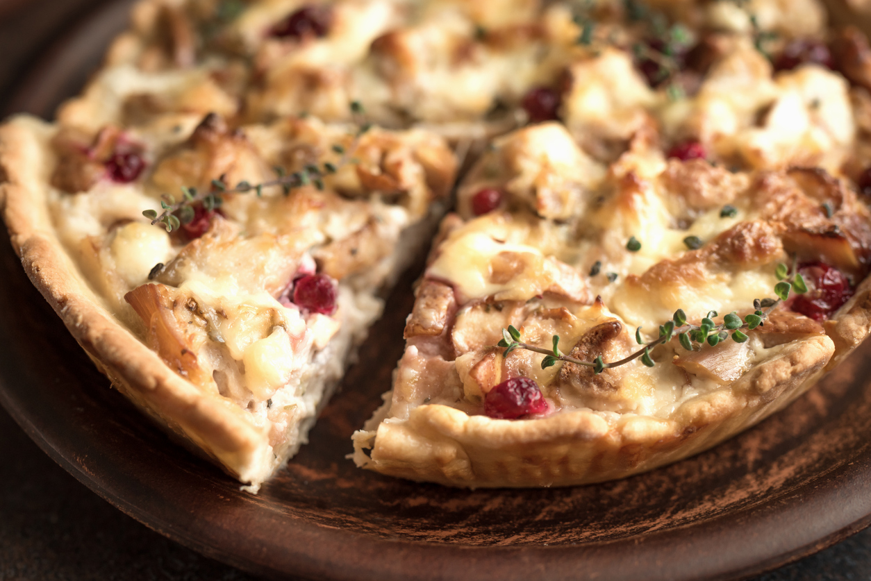 iStock Credit: Mizina leftover turkey tart pie with pears, cheese, and cranberries