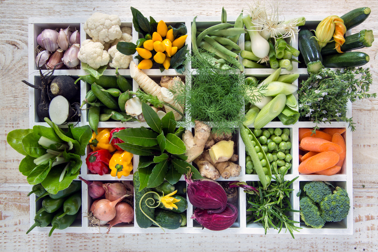 iStock Credit: alle12 an assortment of vegetables arranged in a box of twenty-four cubbies