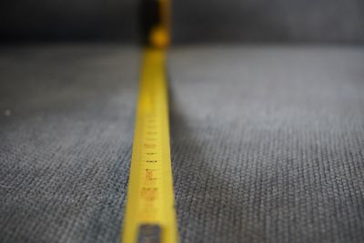 iStock Credit: Wirestock A blurry, extended tape measure