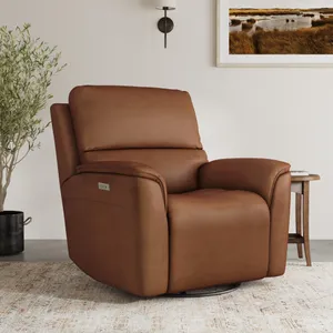 The Flexsteel Henrick power swivel recliner chair in a living room 