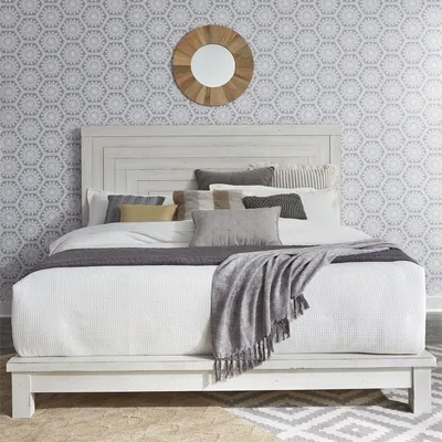 Credit: Liberty Furniture The Liberty Furniture Modern Farmhouse panel bed with décor
