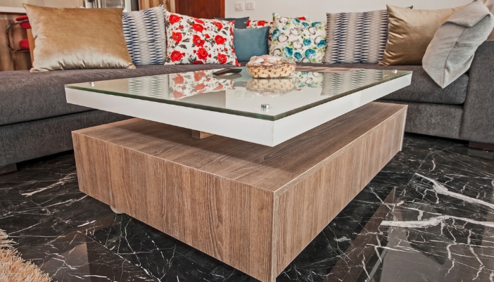 Furn_Furniture-Forecast_4.jpg Closeup of living room with storage coffee table and a sectional