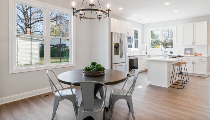 An empty round dining table in a modern home.