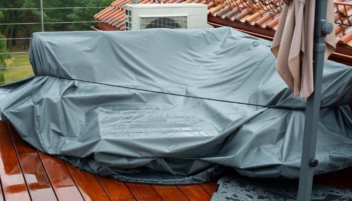 Furn_Protect-Outdoor-Furniture_3.jpg Outdoor furniture covered during rainy day