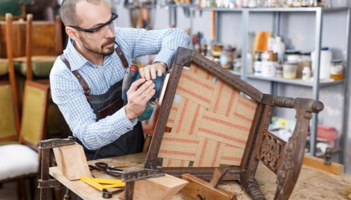Furn_Protect-Outdoor-Furniture_5.jpg Man repairing outdoor chair