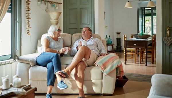 Sitting on a Couch Couple Sitting on a Loveseat