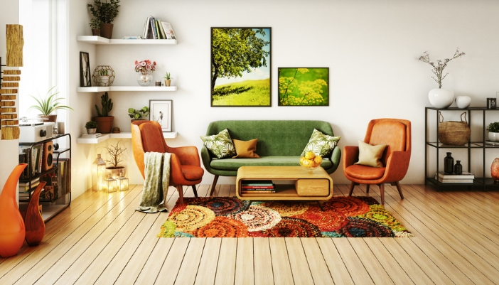 A retro styled living room with green and brown furniture and a record player to the side.