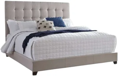 Credit: Signature Design by Ashley Front view of the Signature Design by Ashley Dolante upholstered panel bed