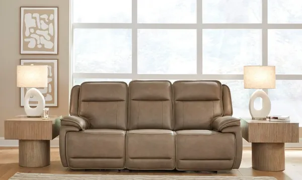 The Signature Design by Ashley Glencroft relining sofa in a modern living room