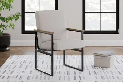 The Signature Design by Ashley Montia office chair with décor 