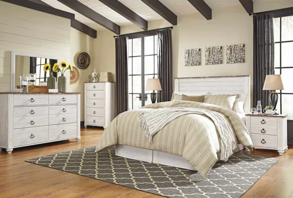Credit: Signature Design by Ashley A bedroom featuring Signature Design by Ashley Willowton bedroom furniture