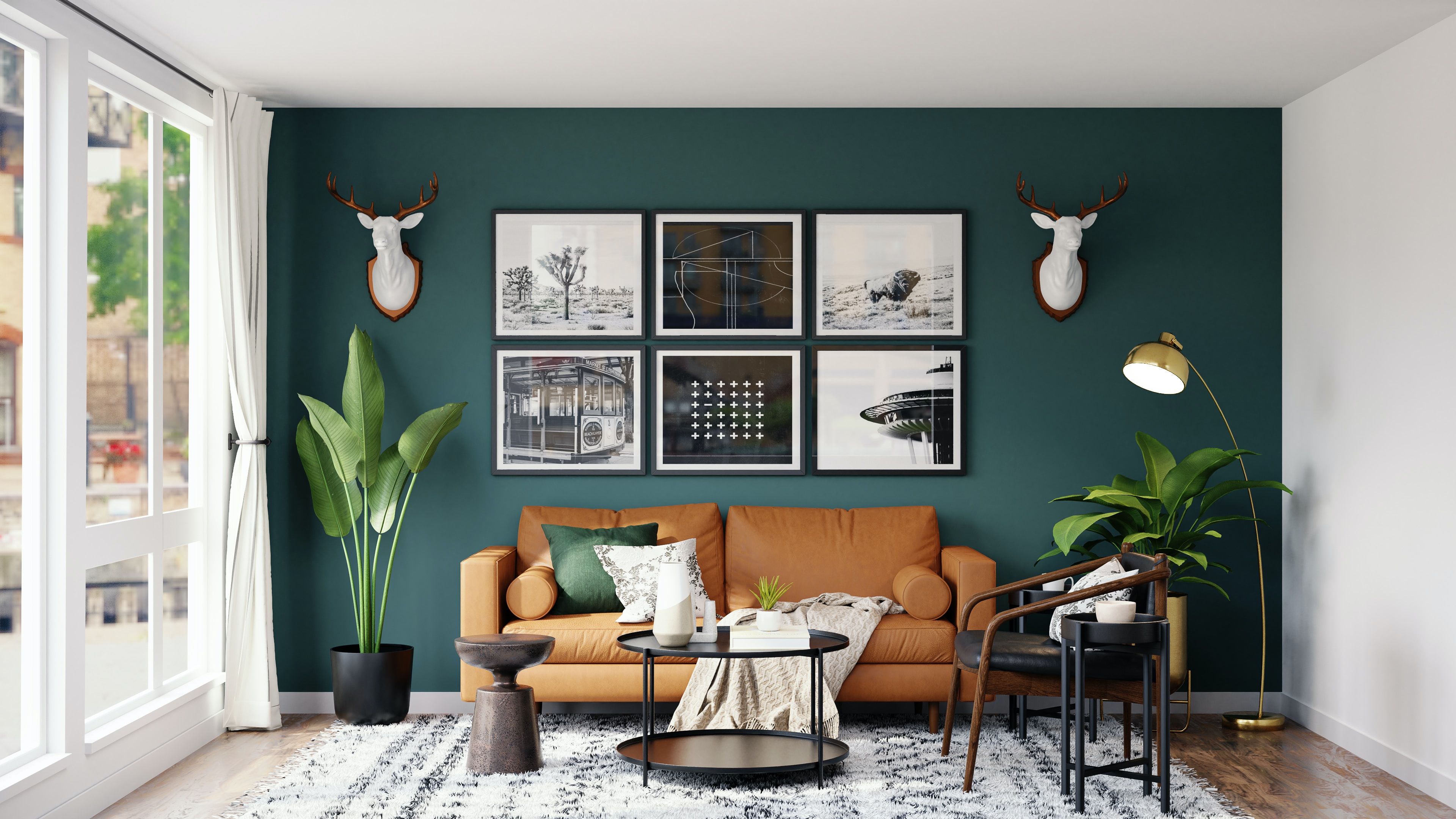 Brown leather loveseat in a modern living room with green walls