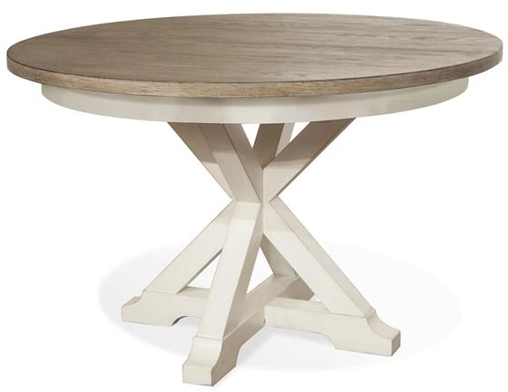 Credit: Riverside Furniture The Riverside Furniture Myra collection round two-tone dining room table