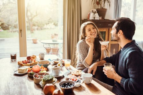 Couple Eating in Their Dining Room
