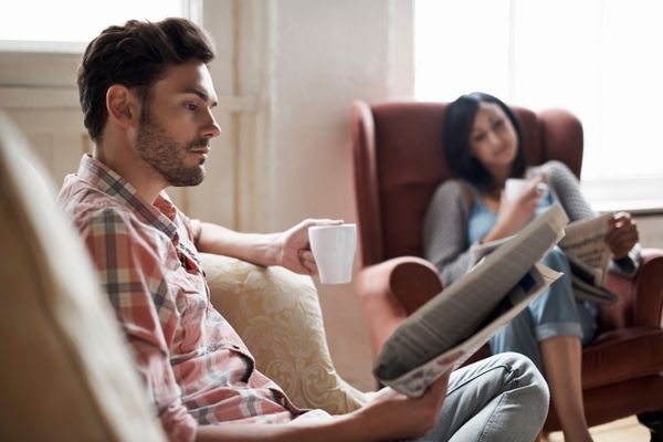 Couple Sitting in Living Room