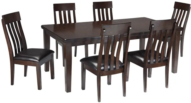 Credit: Signature Design by Ashley Front view of the Signature Design by Ashley Haddigan collection 7-piece dining room set