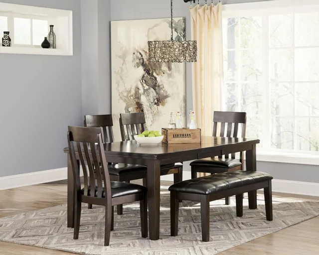 Credit: Signature Design by Ashley The Signature Design by Ashley Haddigan collection dining room set with modern décor