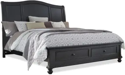 Credit: aspenhome Front view of the aspenhome Oxford collection sleigh bed with bedding and décor