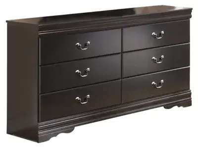 Credit: Signature Design by Ashley Front view of the Signature Design by Ashley Huey collection dresser