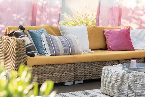 A wide shot of an outdoor sofa A wide shot of an outdoor sofa