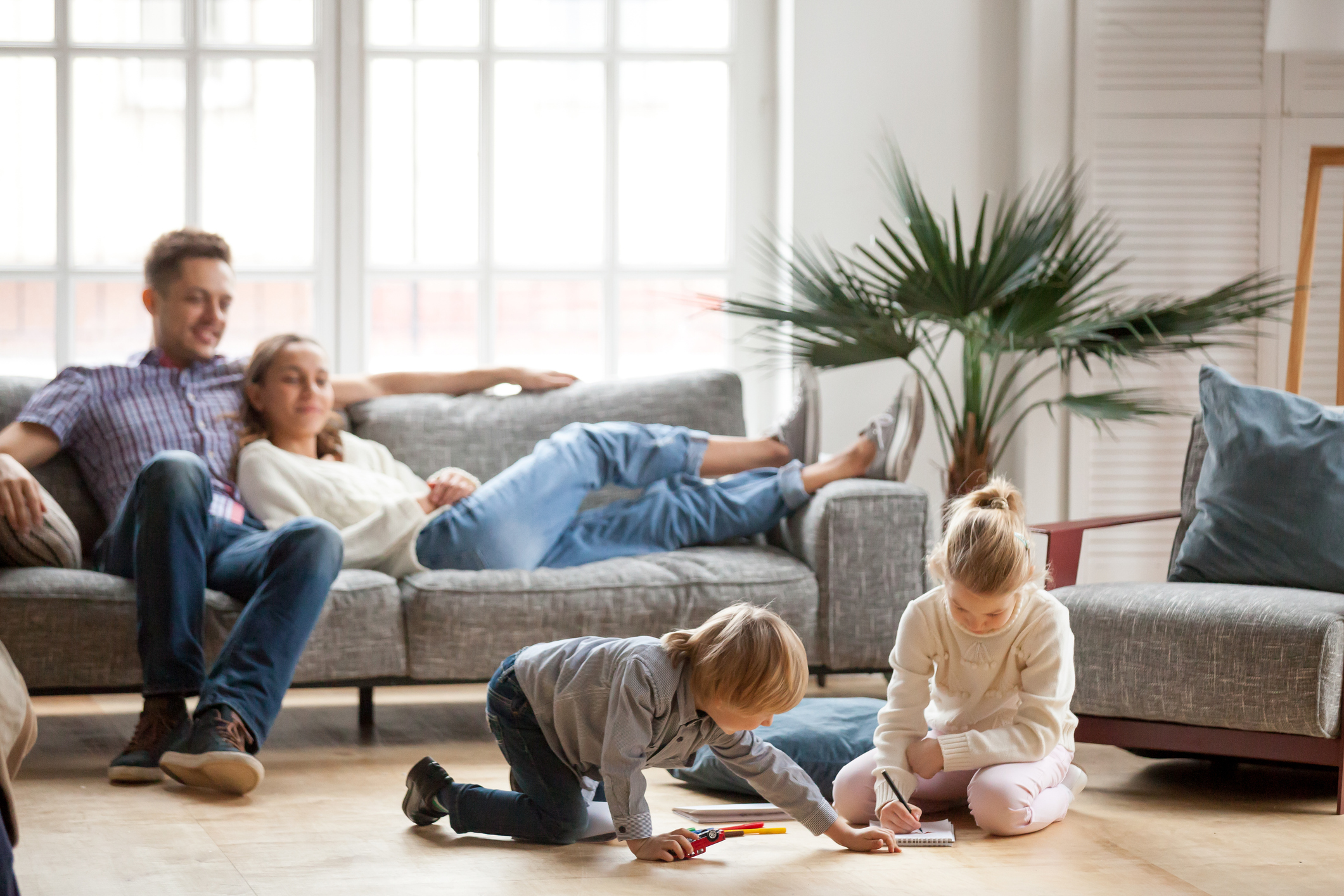 family sitting together on the couch