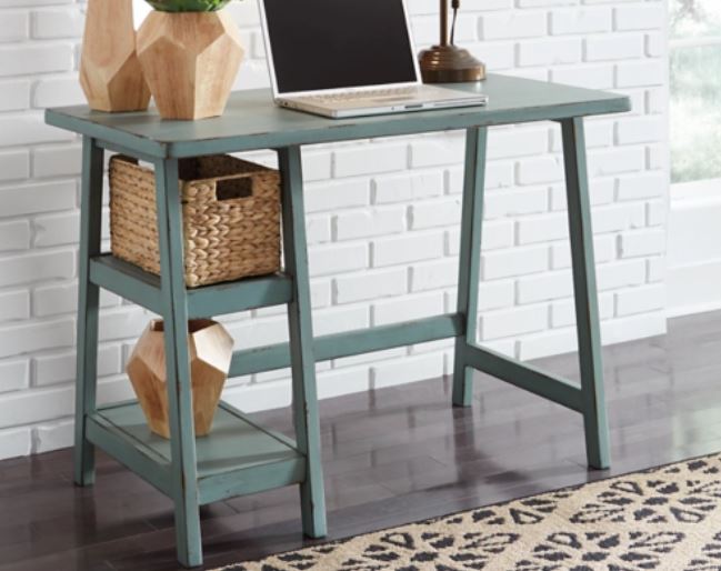teal office table with computer