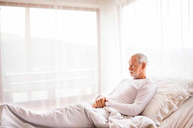 senior man in an adjustable bed