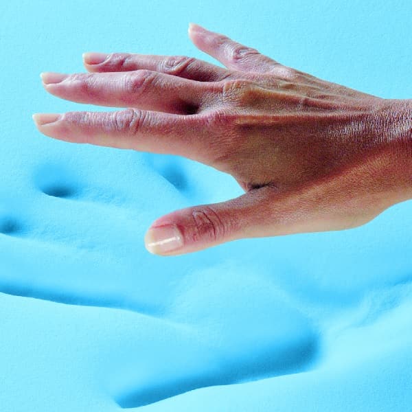 A person pressing into gel memory foam