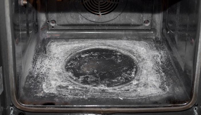 Closeup of the ash left behind after a self-clean cycle
