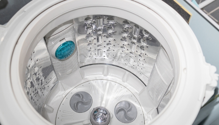 Interior look of an intact and new washer drum