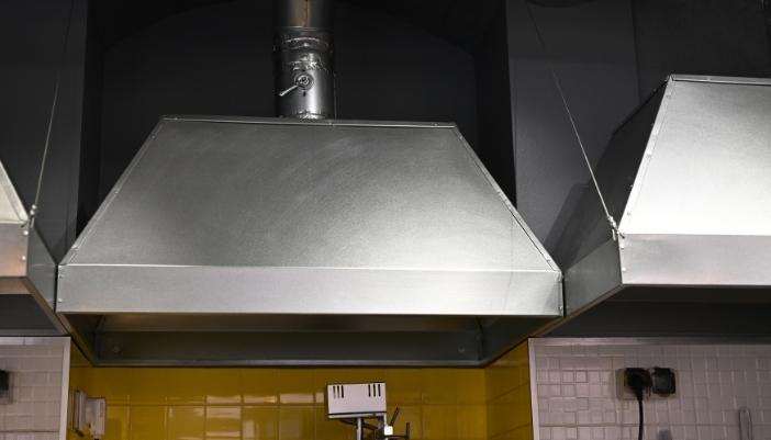 Serv_Range-Hood-Problems_4.jpg Closeup of a range hood and the ducting above it