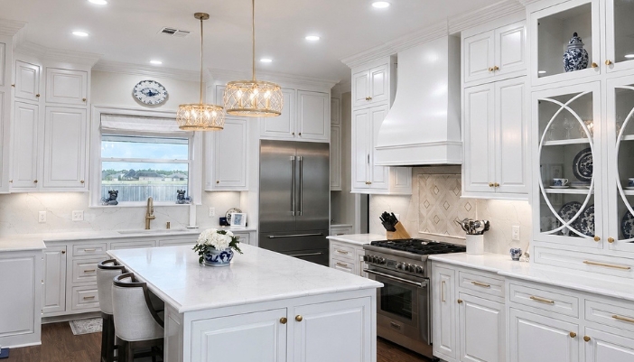 A kitchen set up for entertaining with room for guests to gather