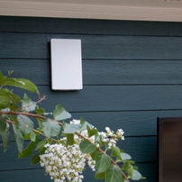 Access panel on a blue siding