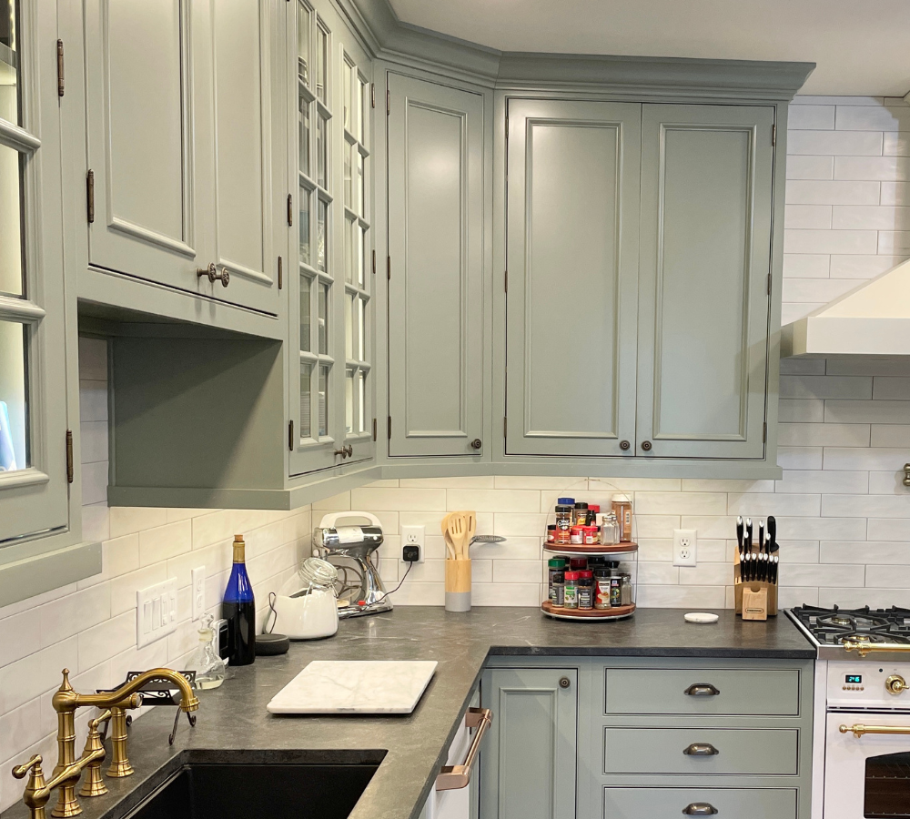 kitchen in evergreen fog light green cabinet finish