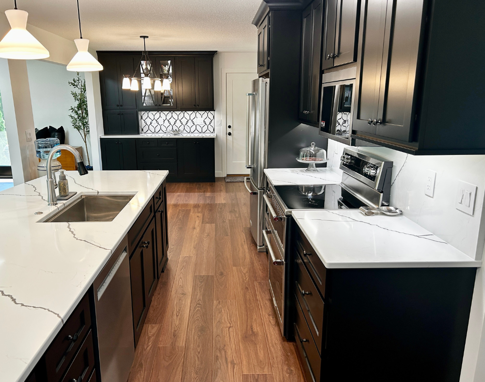 kitchen remodeler Village Home Stores design with walls removed and new open dining area on end of kitchen