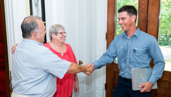 A Bekins service provider enters a customer’s home.